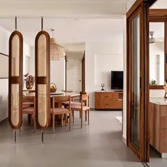 A complete transformation of a 40-year-old apartment into a Rooted Japandi Home. By removing walls and introducing natural materials, I created an open, bright, and warm space that seamlessly connects the kitchen, dining, and living areas.