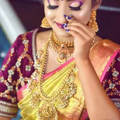 A close up of this beautiful bride's final look. I used a soft, natural HD makeup technique with a pop of color on the eyes to complement her gorgeous silk saree. Notice the details, from the perfectly blended eyeshadow to the sharp winged eyeliner and the elegant nail art.