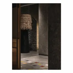 The 'Zen Garden' spaces in our 'Frozen' retail design. Each area features a unique, obscure object, like this large floor lamp with a thatch shade, designed to create curiosity and conversation.