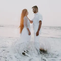 A beautiful moment captured in the ocean surf. We love using natural elements like water and light to create dynamic and romantic pre-wedding beach photos.