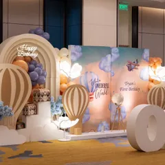 If you can dream it, I can build it. This "Wonderful World" hot air balloon theme for a first birthday is a testament to my belief that events are art. The grand scale, custom props, and ethereal lighting come together to create a truly immersive world for your celebration.