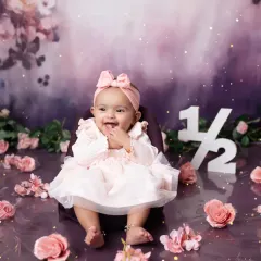 Halfway to one! We love celebrating the 6-month milestone with adorable setups like this floral one.