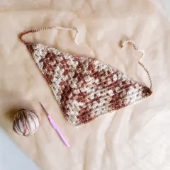 My crochet bandana headband is a stylish accessory for a bohemian or cottagecore look. It's lightweight and can be made in any color combination.