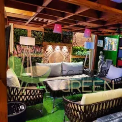 This cozy corner shows how my dark wicker furniture can create a rich, sophisticated atmosphere. The deep seating and plush cushions make it the ideal spot to relax and unwind, surrounded by lush greenery.