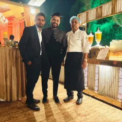 We value our clients and the trust they place in us. Pictured here with a happy client, we believe that building strong relationships and providing elegant, reliable service is the key to a successful event.