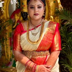 A beautiful bride ready for her muhurtham. I focused on creating a flawless base that looks like real skin, paired with traditional eye makeup and lip color that enhances her features and complements her gold temple jewellery.