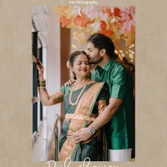 A tender moment from a baby shower, where the husband-to-be gently kisses his wife's forehead. Her traditional green saree and the warm lighting create a beautiful, intimate portrait.