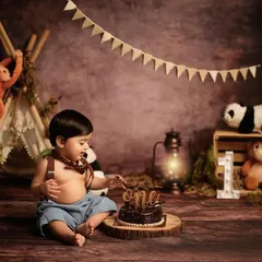 Let the wild rumpus start! A first birthday cake smash is a wonderfully messy and fun way to mark a major milestone. We customize every detail, like this jungle adventure theme, to bring your vision to life.
