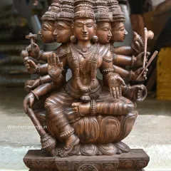 A magnificent 36-inch sculpture of Panchamukha (five-faced) Gayathri Devi with ten hands. This complex and powerful form represents the unity of divine forces and is a masterpiece of our carving skill.