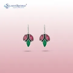 These unique drop earrings are crafted with faceted ruby-red and emerald-green stones in a leaf-like design. The sterling silver setting provides a beautiful contrast to the rich colors.