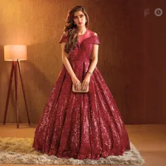 This sparkling red ball gown is perfect for any formal occasion. Rent this showstopper to shine at your reception, sangeet, or any special event.