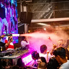 Unleashing the CO2 gun on a packed dance floor. I use these special effects to punctuate the biggest drops in my set, creating unforgettable moments of collective euphoria.