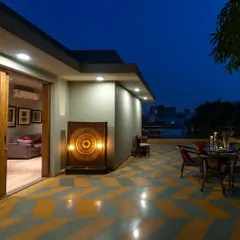 Openness, fresh air, and a seamless blend of indoor-outdoor living. Our villa terraces, like this one with its bold chevron flooring, are designed to enhance your space with elegance.