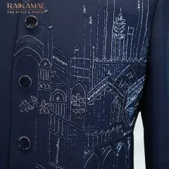 A unique embroidery design depicting a cityscape on a navy blue Indo-Western jacket. This detail shows my creative approach to traditional menswear.