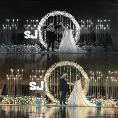 A stunning collage from a Sangeet or engagement night, showing the couple's dance performance on a beautifully lit stage with pyrotechnics. The black and white edits add a timeless, artistic touch.
