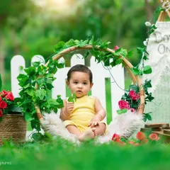 A curious little one enjoying the fresh air during an outdoor shoot. The "Boys Only!" sign on the teepee adds a playful touch to this personalized setup.