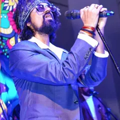 Lost in the music. This is me in my element, feeling every note during a live sufi rock performance. This is the passion I bring to every show, whether it's a large concert or an intimate wedding gig.