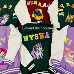 Our personalised varsity jackets are a huge hit. We can add names with colorful chenille letters and fun patches like unicorns or superheroes to create a truly unique piece.