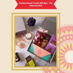 For the sibling with a sweet tooth, the Festive Sweet Treats Gift Box is a dream come true. It features decadent dark chocolate, roasted hazelnuts, and other indulgent goodies, beautifully presented for Rakhi.