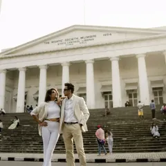 For the modern couple, we used the grand architecture of Mumbai's Asiatic Society Library as our backdrop. It’s a stylish pre-wedding shoot that shows love can be both powerful and chic.