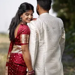 A beautiful, candid moment from an engagement shoot. The soft, natural makeup and simple hairstyle allow the couple's connection to be the focus.