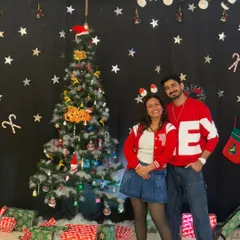 Posing by the Christmas tree at our studio. We decorate our space for all major festivals to create a celebratory atmosphere for our classes.
