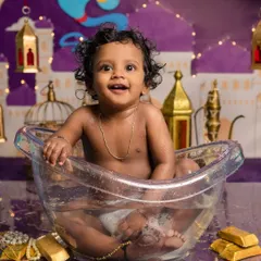 A whole new world of cuteness! This Aladdin-themed bath session is a perfect example of how we can bring fantasy and fun to a baby milestone shoot.