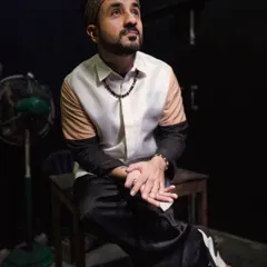 We had so much fun on set with the brilliant Vir Das for his Chennai show. This backstage shot captures a quiet moment before the performance. We styled him in a modern, color-blocked shirt from Maison Tai that reflects his unique and sharp personality.