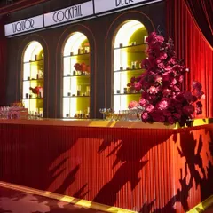 The Art Deco-inspired bar we designed for the theatre-themed Sangeet. Every detail, from the lighting to the floral arrangements, was curated to immerse guests in the glamorous, cinematic atmosphere.