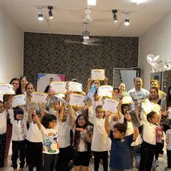 And that's a wrap on another amazing summer camp! This group photo with all the kids and their parents holding up their certificates captures the joy and sense of accomplishment we all feel at the end.