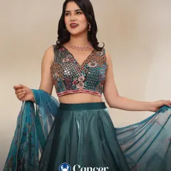 Cancer, your style is elegant and romantic. This teal lehenga with a beautifully embroidered blouse matches your graceful and intuitive vibe.