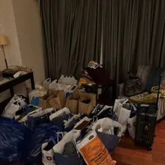 A real, unfiltered look at my workspace during a major project. This is what a "wardrobe dump" looks like after sourcing for a multi-event wedding.