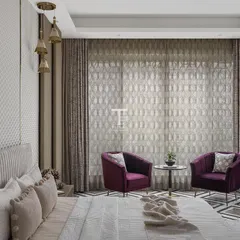 A wider view of the bedroom with 3D wall paneling, showing the cozy seating nook we created with two custom-made armchairs. This adds another layer of function and comfort to the master suite.