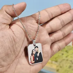 Keep your loved ones close with a custom photo pendant. I can print a high-quality color photo on this durable metal tag, which comes with a silver chain.