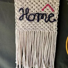 A simple yet stylish wall hanging for your entryway or living room. I love how the navy blue 'Home' script pops against the off-white macrame.