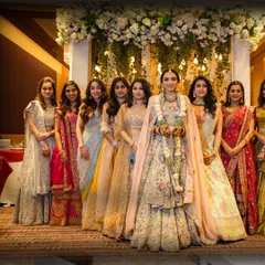 A stunning portrait of the bride with her bridesmaids, a cherished memory from the wedding day.