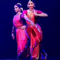 This image shows the seamless coordination required in duet work. We work on mirroring movements and maintaining a strong connection to perform as one entity.