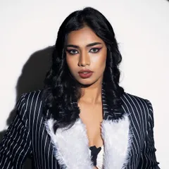 A powerful portrait from a vintage Hollywood-themed shoot. The model is wearing my custom pinstripe blazer with a white faux fur collar.
