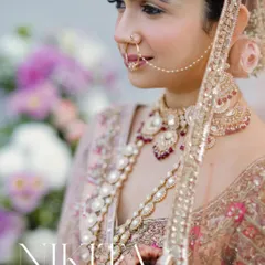 A soft and elegant close-up of the bride, capturing the delicate details of her outfit and jewelry.