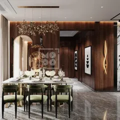 A different angle of the dining space in our Dadar home, highlighting the custom lighting and art that add a layer of personality and sophistication to the wooden walls.