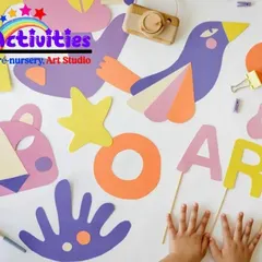 Art is all around us. This flat-lay of colorful paper cutouts shows the kind of creative exploration we encourage. We provide the tools and the space for kids to experiment with shapes, colors, and materials to express their unique ideas.