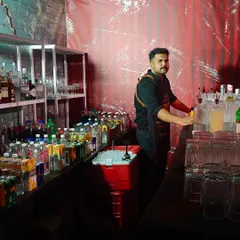 Our professional bartender manning the station at a corporate event for Barsquare India at the JW Marriott. We ensure seamless service for your company's important functions.