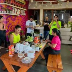 Fitness is also about balance and community. Here, our members are enjoying a well-deserved post-workout meal together right here in the studio lounge.