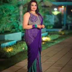 A portrait of a guest at an evening function, using the ambient light to create a nice mood.
