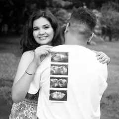 A creative announcement shot featuring the sonogram pictures. The black and white treatment gives this outdoor portrait a timeless and classic feel.