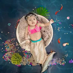 A full view of the mermaid setup, complete with sparkling treasures and sea life. Every detail is crafted to build a magical world for your baby.