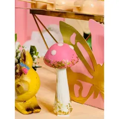A close-up of a mushroom-shaped dessert, perfectly matching the whimsical party theme. Even the treats are part of the story.
