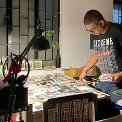 The solitary work of an artist is nurtured here. This photo shows the late-night process of reviewing prints and planning for a new book project.