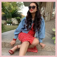 A denim jacket is the ultimate layering piece. Here, I've thrown a puff-sleeve denim jacket over a red floral dress to make it more casual and add a bit of warmth for a cooler day.