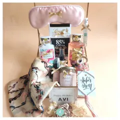 I created this "Super Mom" birthday hamper to be a box full of pampering and appreciation. It’s packed with everything she needs to relax and feel special, from scented lotions and dark chocolate to a cozy silk eye mask.